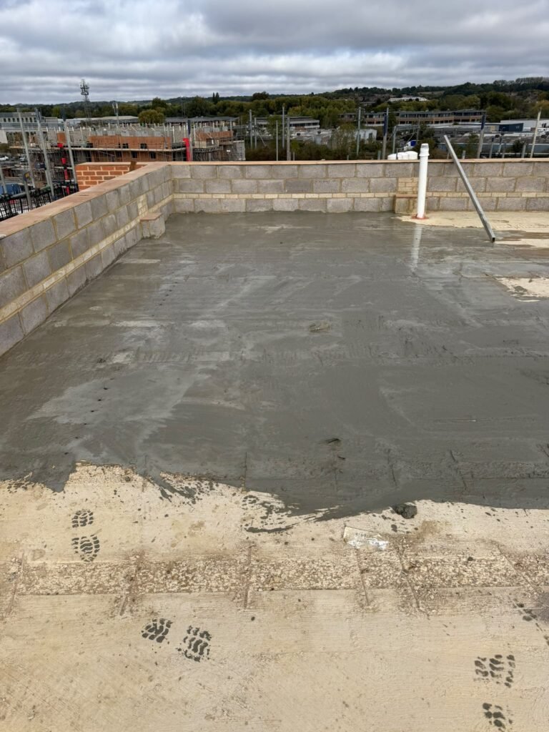 Roof substrate preparation ahead of bonded screeding in Newbury